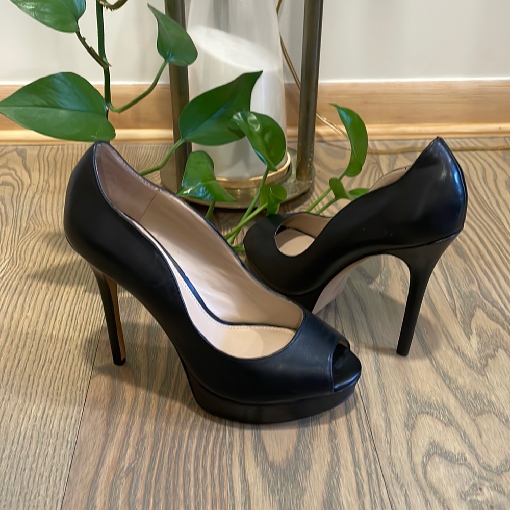 Vince Camuto peep toe platform pumps